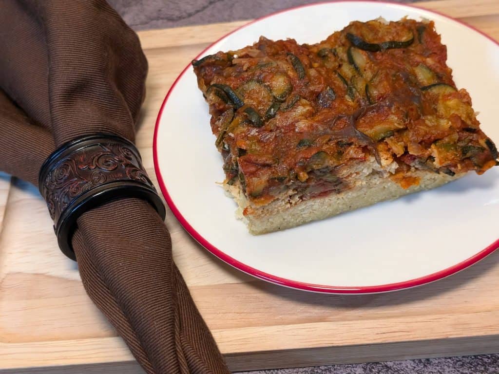 Saucy Zucchini Biscuit Bake plated, showing cross-section