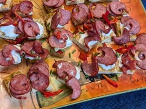 Mini Frittatas with Smoked Sausage and Creme Fraiche on a serving platter