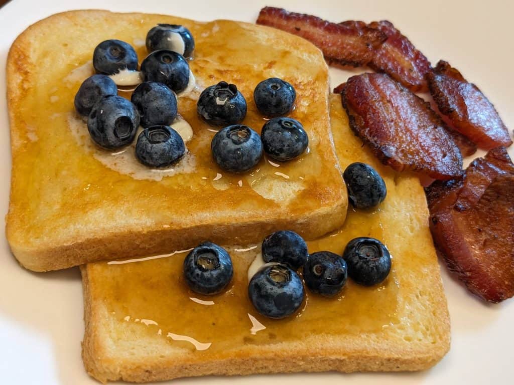 Keto French Toast plated with blueberries