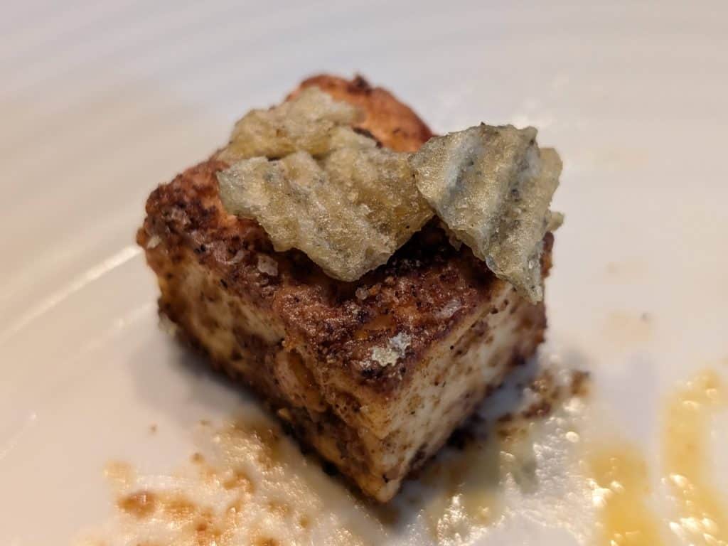 Spiced and Seared Paneer Cube on a plate