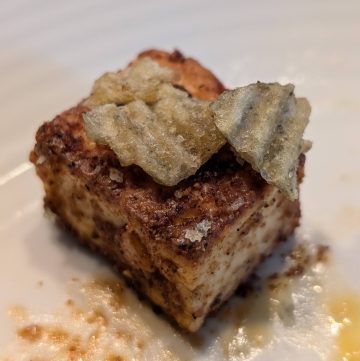 Spiced and Seared Paneer Cube on a plate