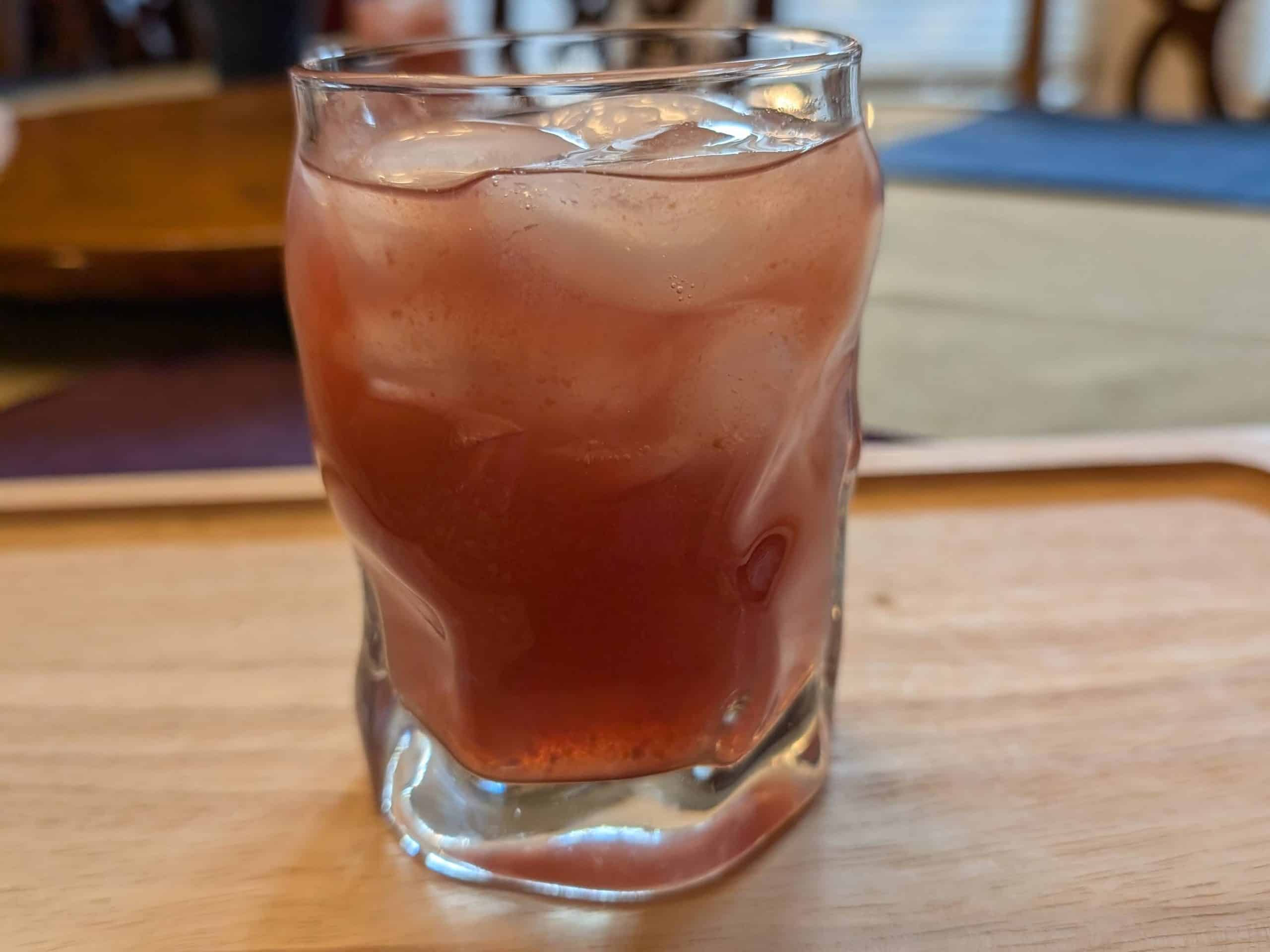 Sugar Free Blackberry Pisco Sour in a rocks glass