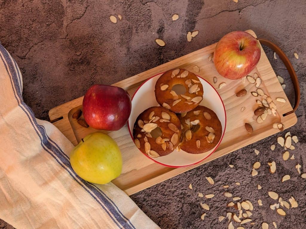 Almond Flour Apple Muffin Rings plated with some apples