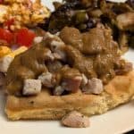 Spiced Turkey with a Rich Pumpkin Wine Reduction Sauce on a Savory Herbed Waffle plated