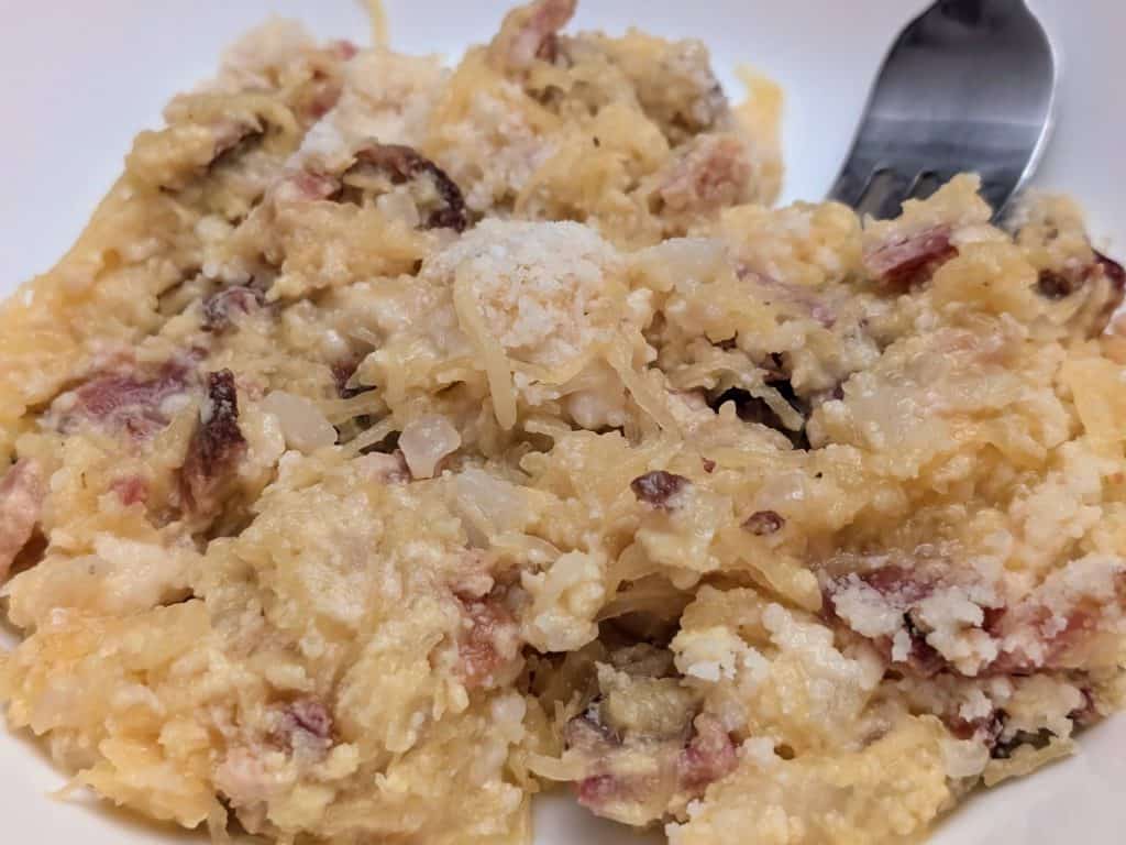 Spaghetti Squash Carbonara plated with a fork