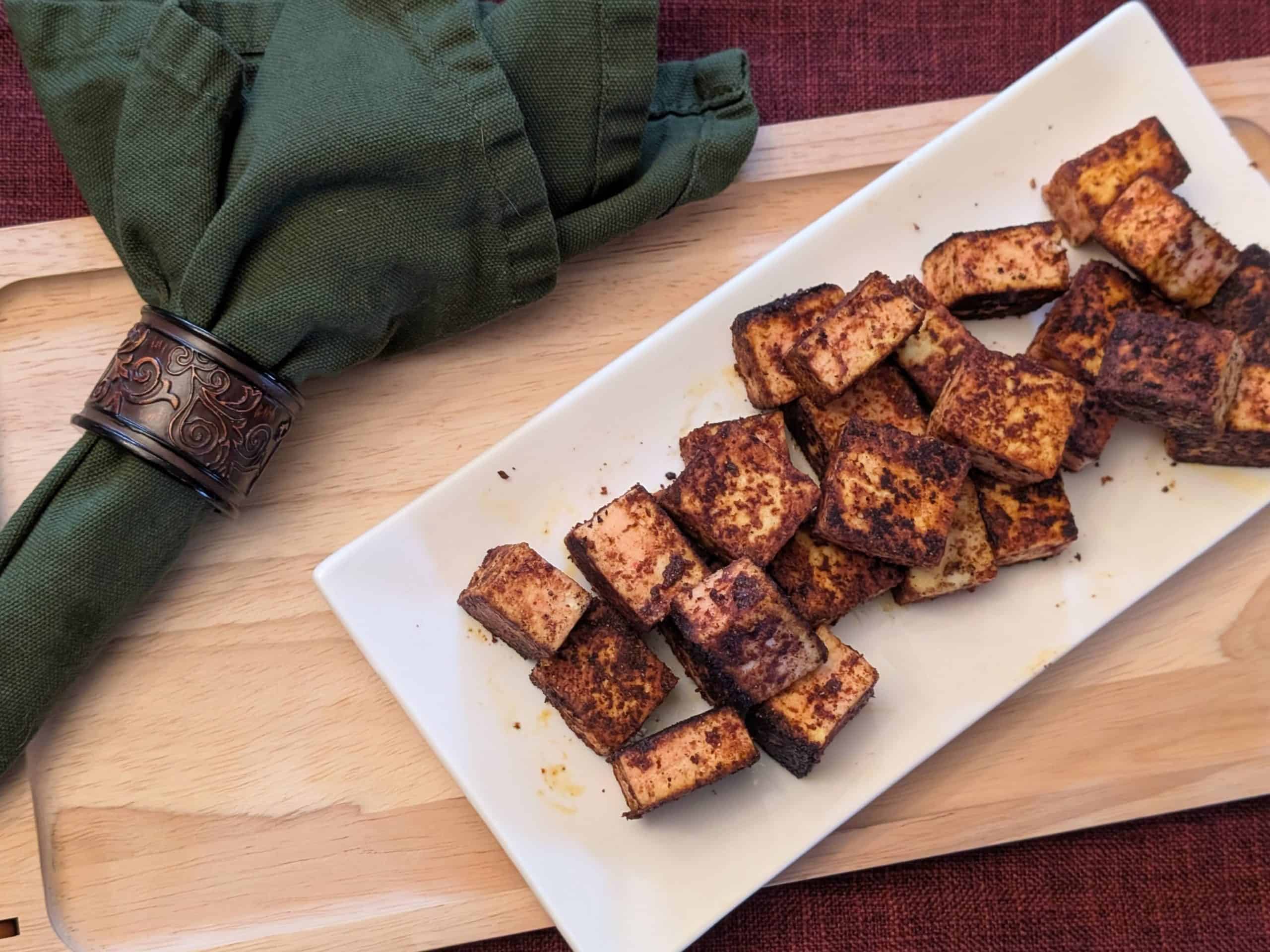 Spiced and Seared Paneer Cubes on a plate