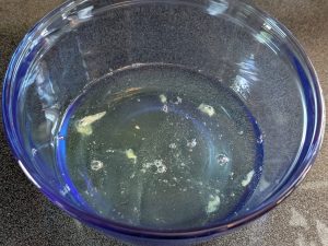 Egg whites in a mixing bowl, not yet beaten