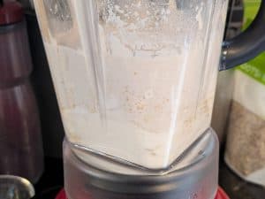 Semi-blended cashews and soaking liquid for cashew cream
