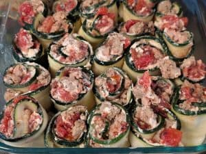 Pizza Masti Zucchini Roll-ups prepared and in a baking dish before baking