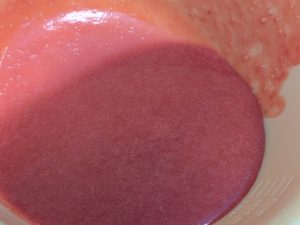 Strawberry Purée in a bowl after straining out the seeds